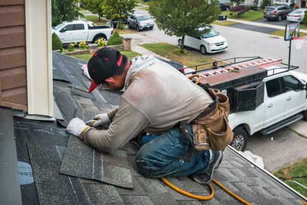 Professional Gutter Repair And Installation technician working in Milford, IA